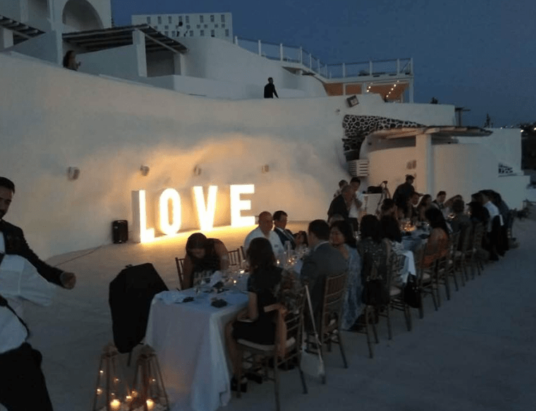 lluminated Letters at Rocabella venue in Santorini - Lightup Letters , Destination Wedding in Santorini | Hire a Wedding Dj | wedding Fireworks